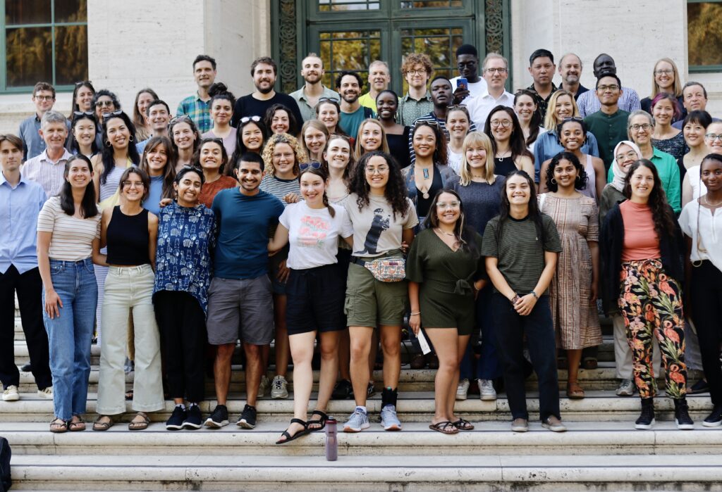 Picture of graduate students and faculty on steps of Giannini Hall. 