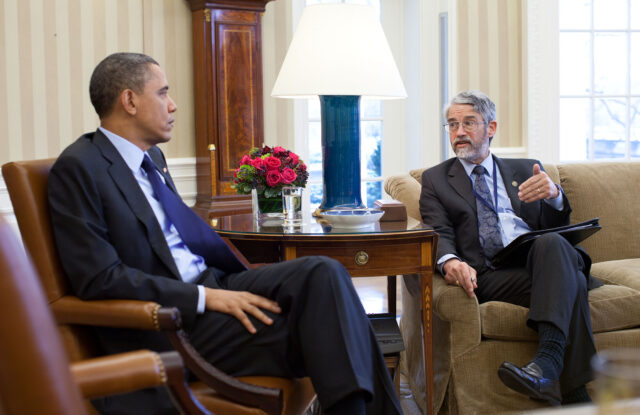 Barak Obama and John Holdren in the oval office.